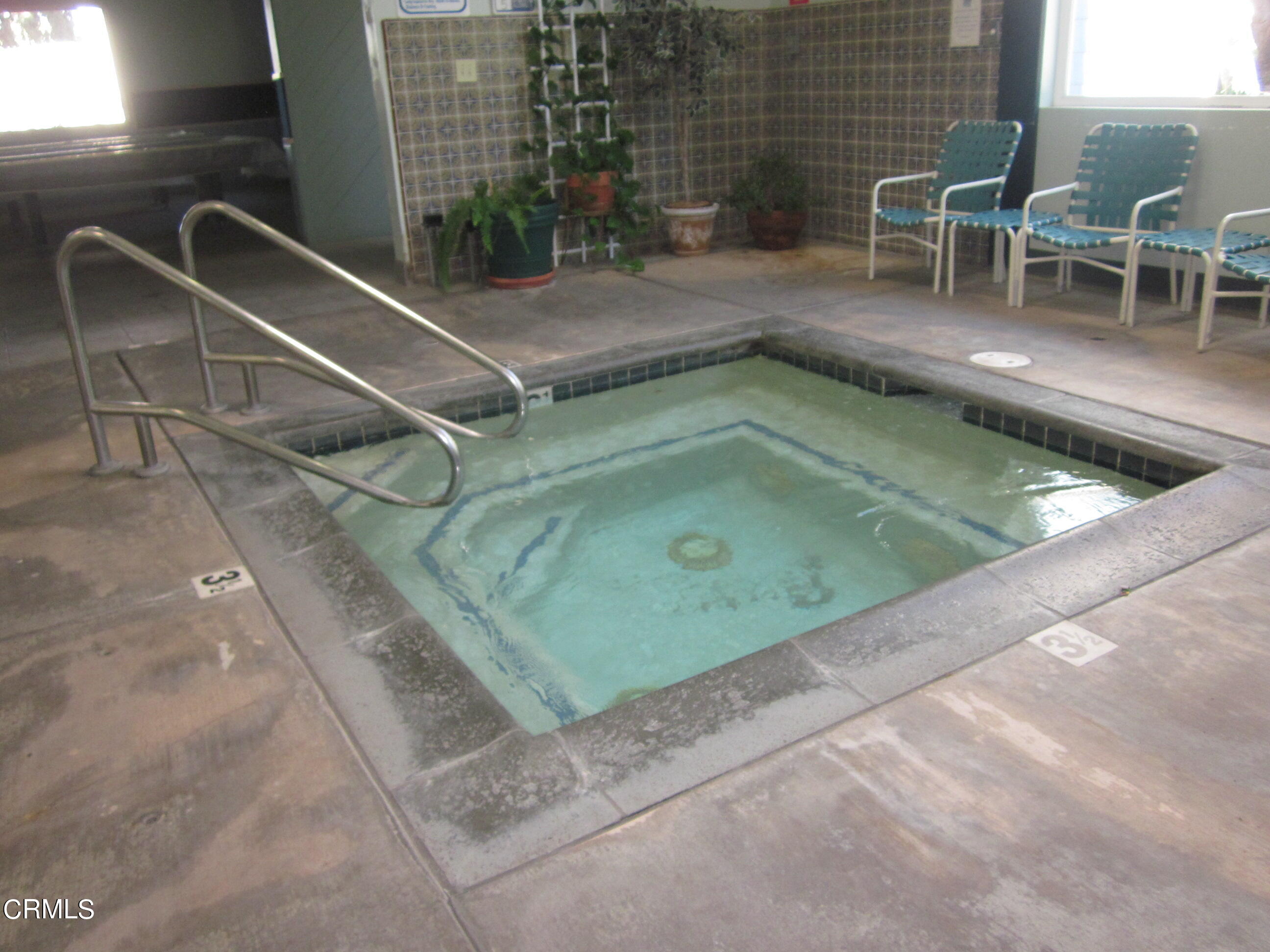 701 Reef Circle Port Hueneme, CA 93041 - Photo 12 of 17 a view of a balcony with table and chairs