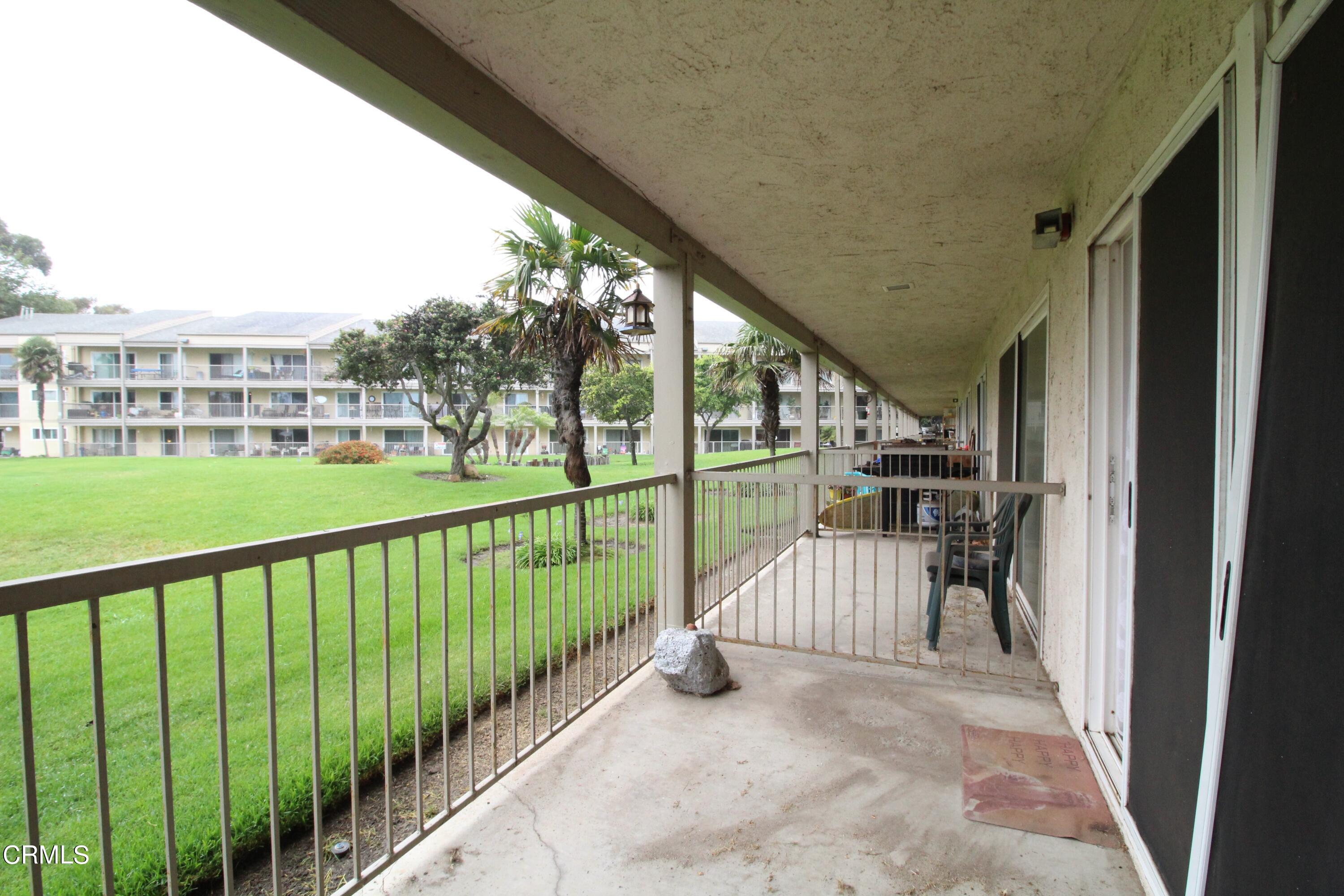 701 Reef Circle Port Hueneme, CA 93041 - Photo 16 of 17 a view of balcony with furniture and garden