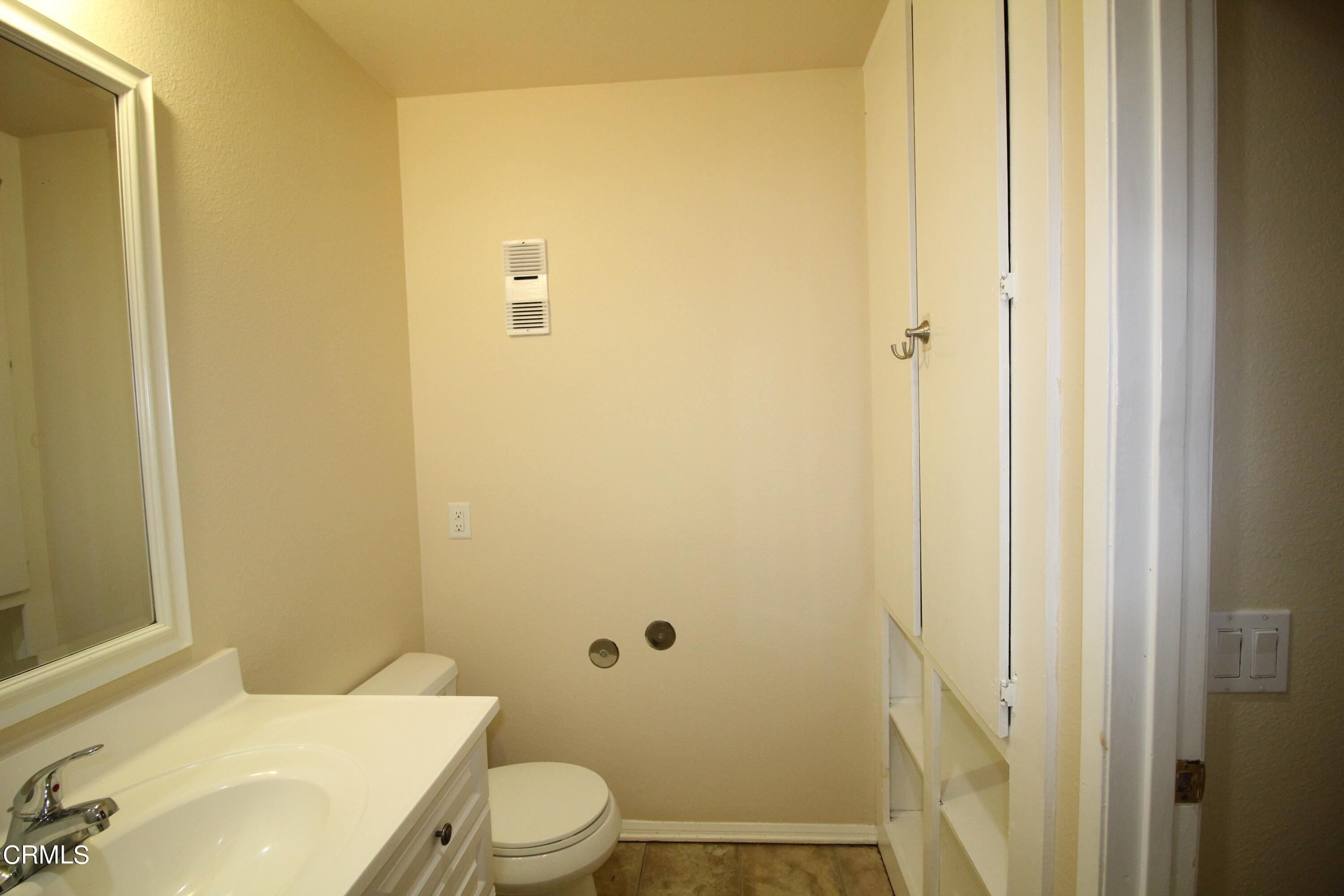 701 Reef Circle Port Hueneme, CA 93041 - Photo 7 of 17 a bathroom with a sink and toilet