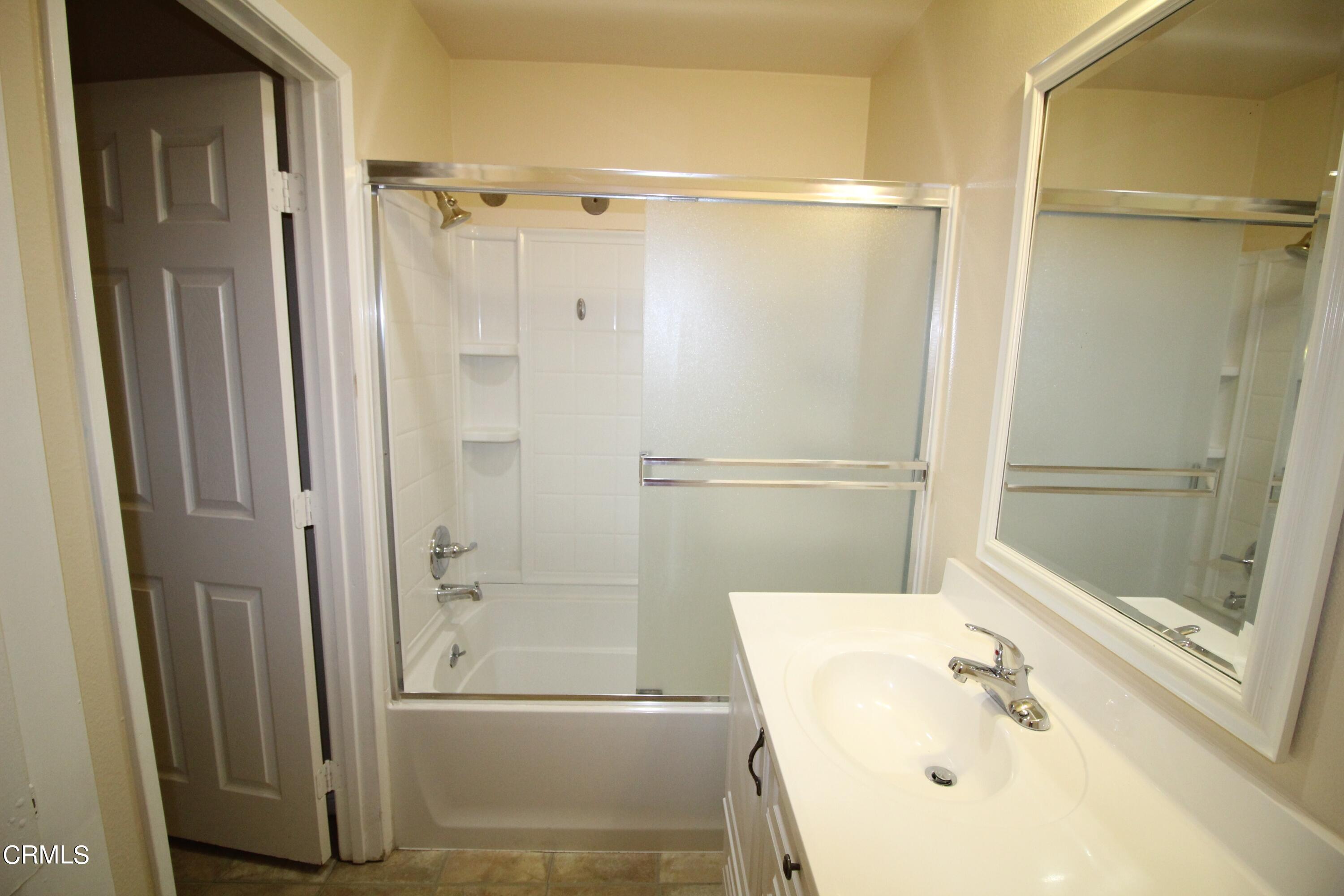701 Reef Circle Port Hueneme, CA 93041 - Photo 8 of 17 a bathroom with a shower and a sink