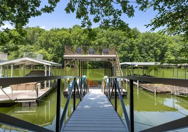 a view of swimming pool with a patio