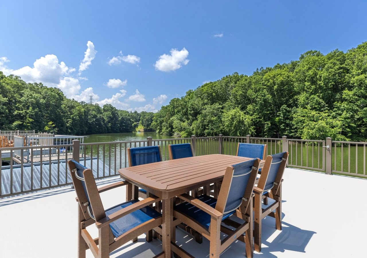 47 Long View Drive Winchester, TN 37398 - Photo 30 of 53 a view of a roof deck with table and chairs a barbeque with wooden floor and fence
