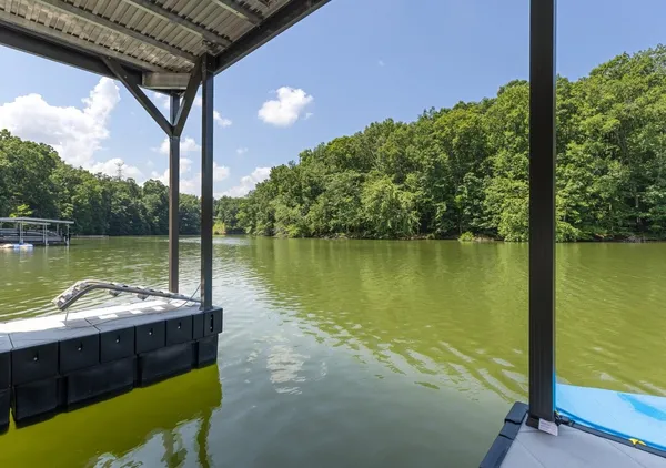 a view of a lake from a balcony