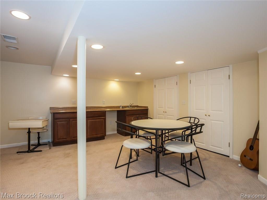 33811 Hunters Pointe Road Farmington, MI 48331 - Photo 19 of 23 Finished Basement Entertainment Area