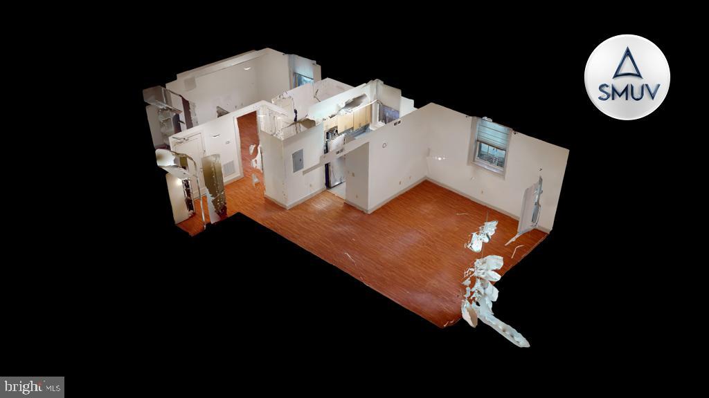 11 East Chase Street, Unit T03 Baltimore, MD 21202 - Photo 19 of 22 a view of a house with a floor to ceiling fan