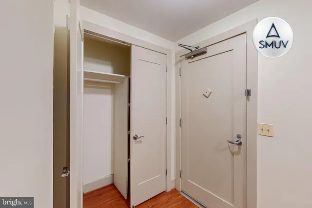 a view of elevator with wooden floor