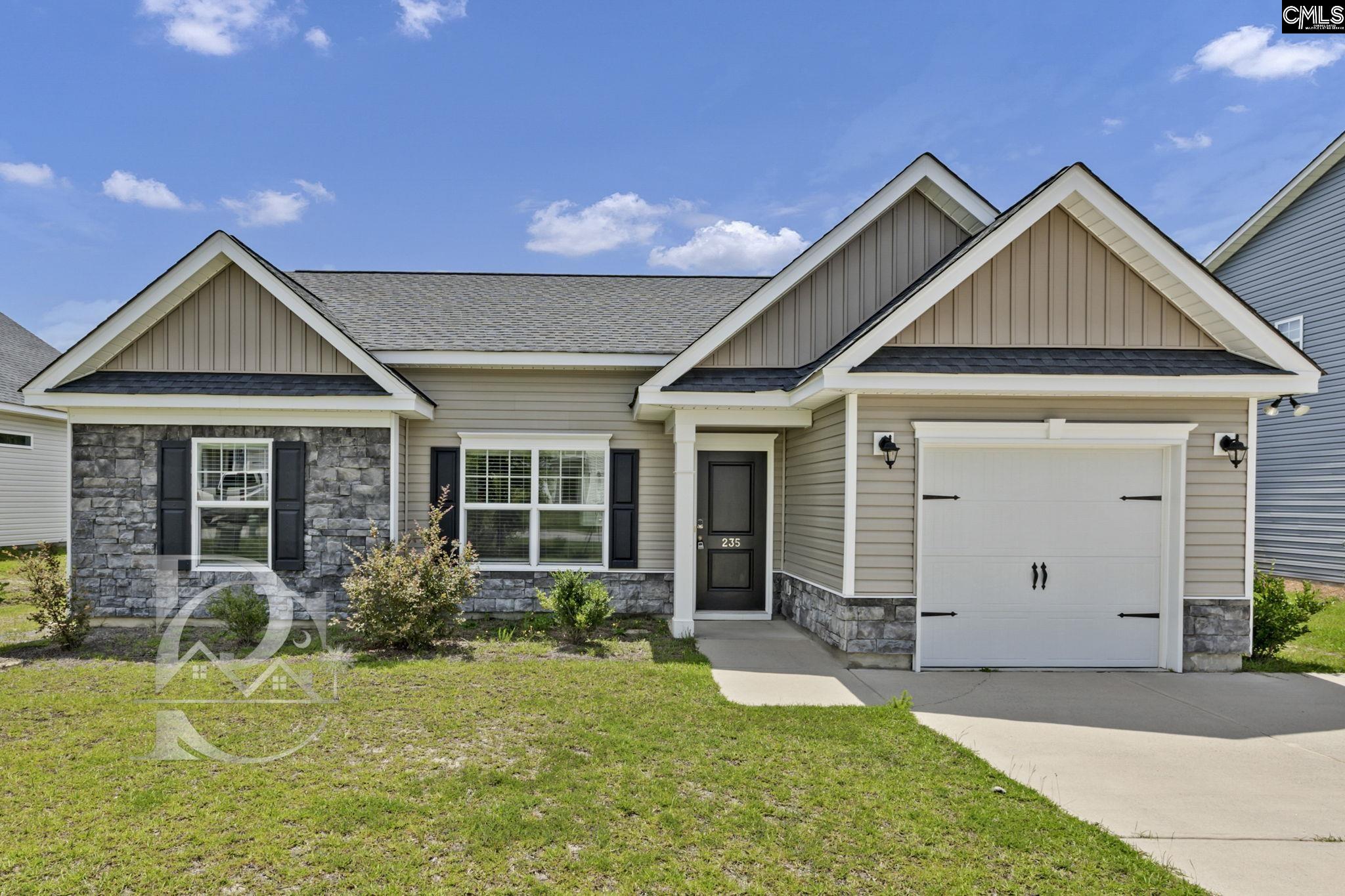 235 Drayton Hall Road West Columbia, SC 29172 - Photo 1 of 24 a front view of a house with garden