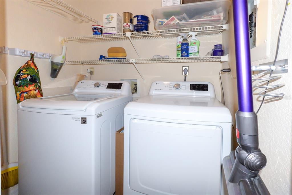 335 Coldeway Drive, Unit F21 Punta Gorda, FL 33950 - Photo 24 of 45 a utility room with dryer and washer