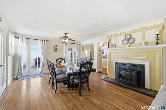 a view of a livingroom with furniture and a fireplace