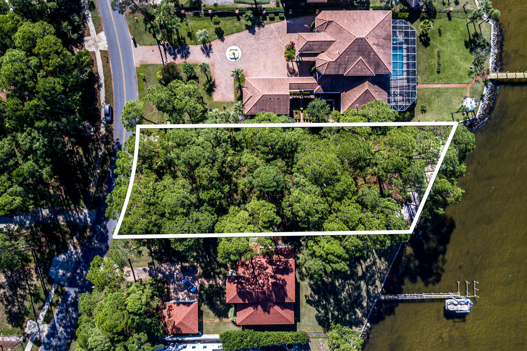 703 Driftwood Point Road Santa Rosa Beach, FL 32459 - Photo 8 of 11 an aerial view of a house garden space and street view