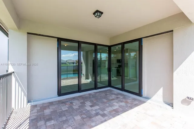 a view of a room with a large window
