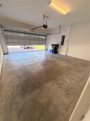 a view of a lake with houses in the back