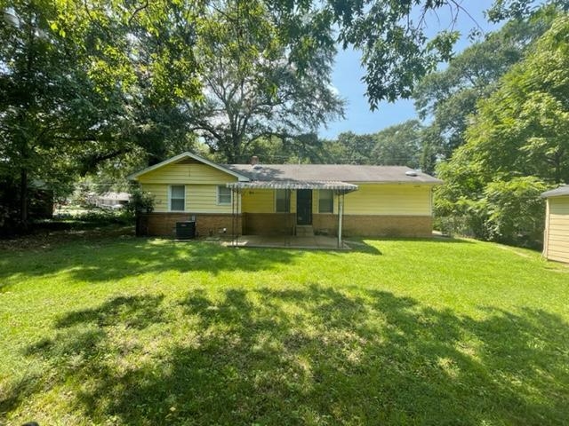 3300 Lucibill Road Memphis, TN 38116 - Photo 12 of 14 a front view of a house with a yard