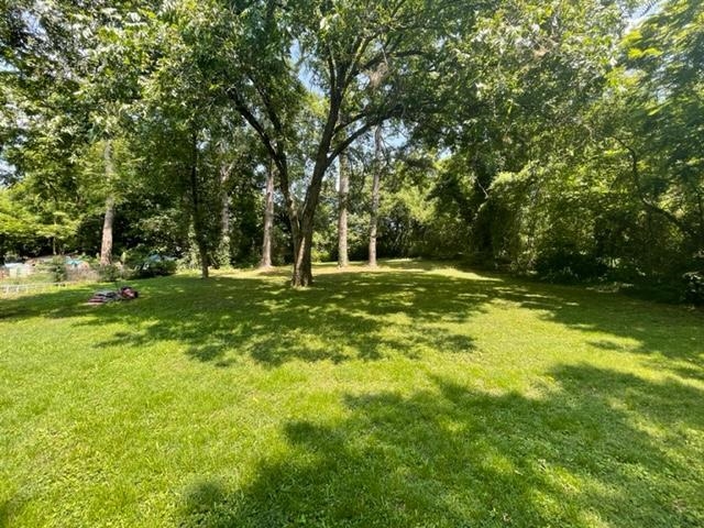 3300 Lucibill Road Memphis, TN 38116 - Photo 13 of 14 a view of outdoor space with deck and yard