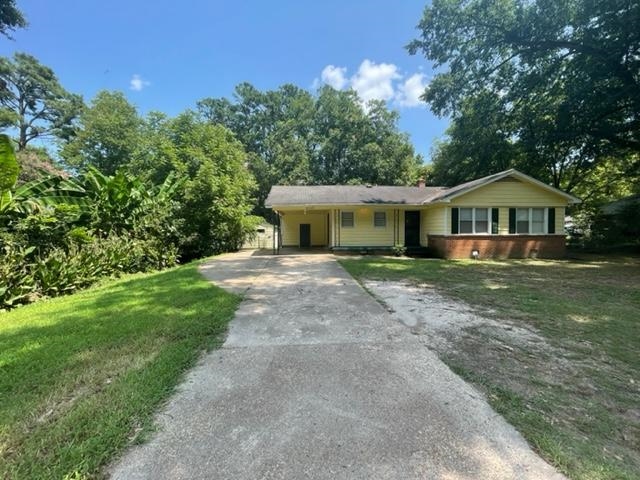 3300 Lucibill Road Memphis, TN 38116 - Photo 14 of 14 a front view of a house with a yard