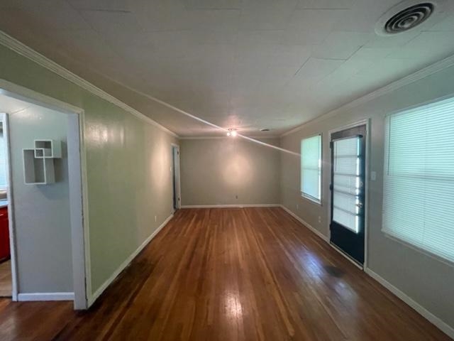 3300 Lucibill Road Memphis, TN 38116 - Photo 10 of 14 wooden floor in an empty room with a window