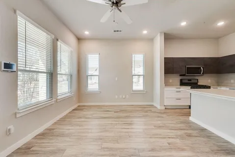 a view of kitchen and microwave