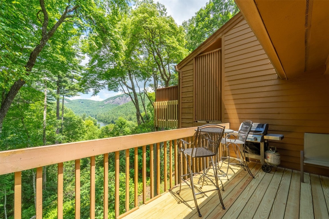 122 Emerald Ridge Road, Unit 45 Sapphire, NC 28774 - Photo 3 of 46 Back deck with mountain and lake views