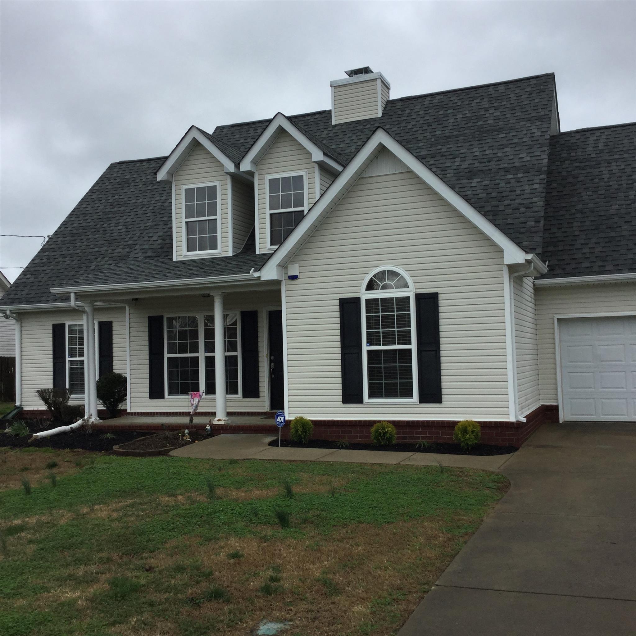 669 Crescent Road Murfreesboro, TN 37128 - Photo 1 of 16 a front view of a house with a yard