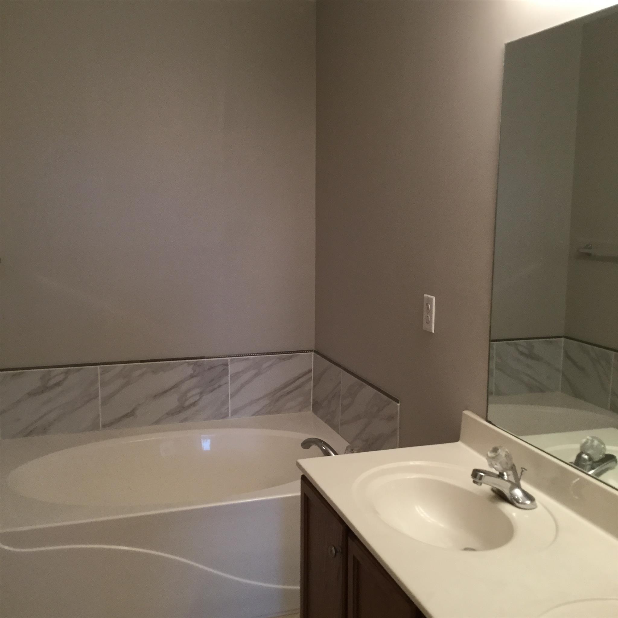 669 Crescent Road Murfreesboro, TN 37128 - Photo 10 of 16 a bathroom with a sink and a mirror