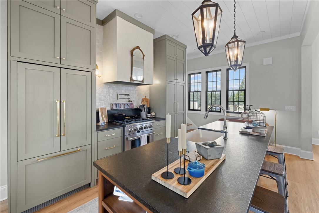 677 Lightwood Road Hartwell, GA 30643 - Photo 10 of 42 An inviting kitchen with modern amenities and abundant natural light creates a perfect gathering space.