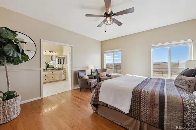 a bed room with a bed and a chandelier