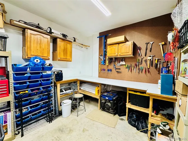 a room with furniture and a flat screen tv