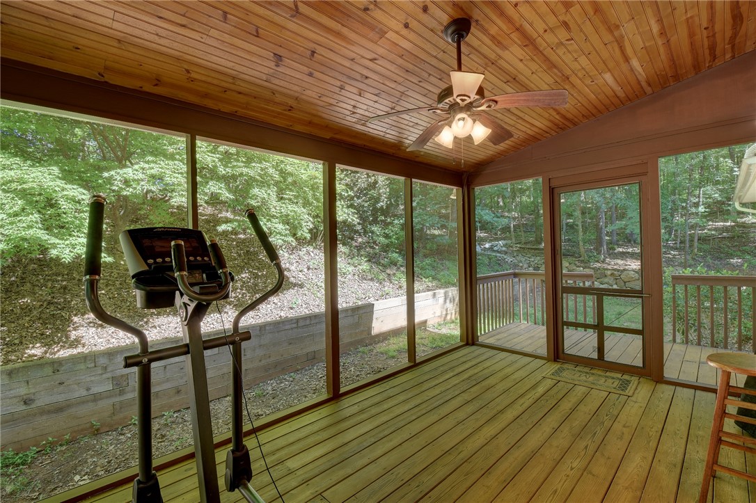 2011 Ridgeview Lane Seneca, SC 29678 - Photo 32 of 37 This inviting screened porch offers serene woodland views and a tranquil retreat.