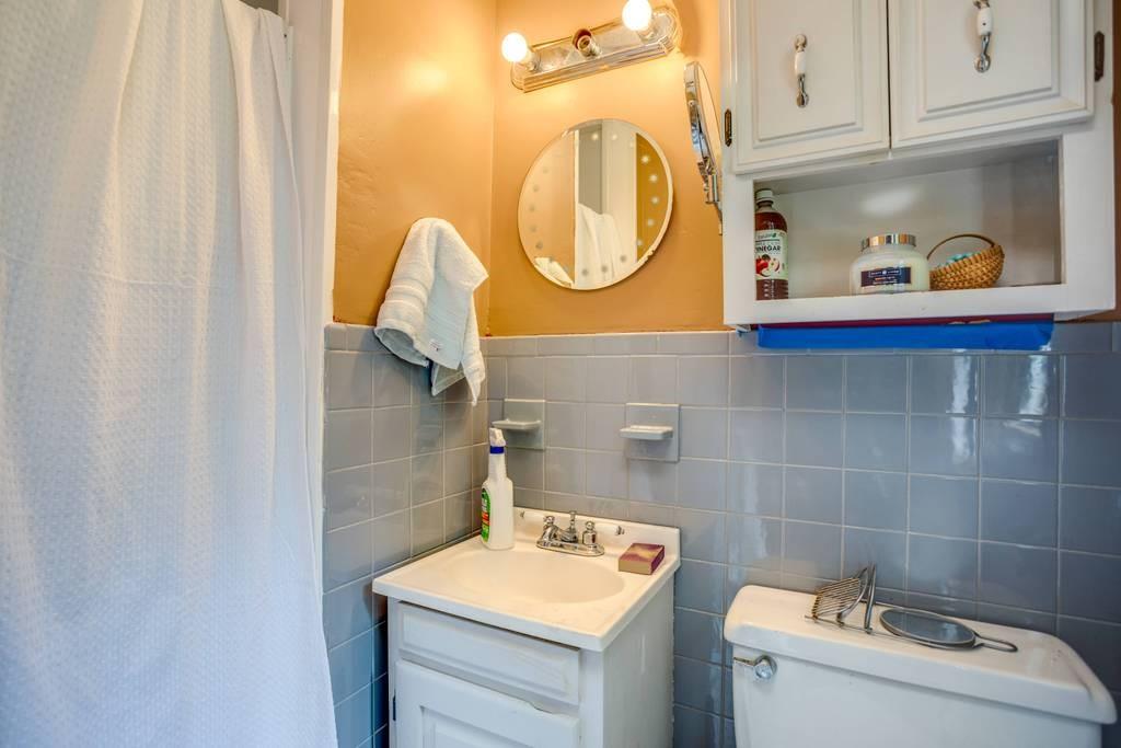 21 Tanner Road Webster, MA 01570 - Photo 20 of 26 a bathroom with a sink and a mirror