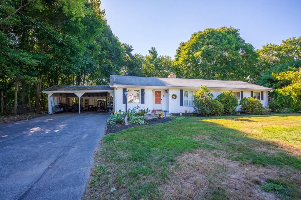 21 Tanner Road Webster, MA 01570 - Photo 3 of 26 a front view of a house with garden