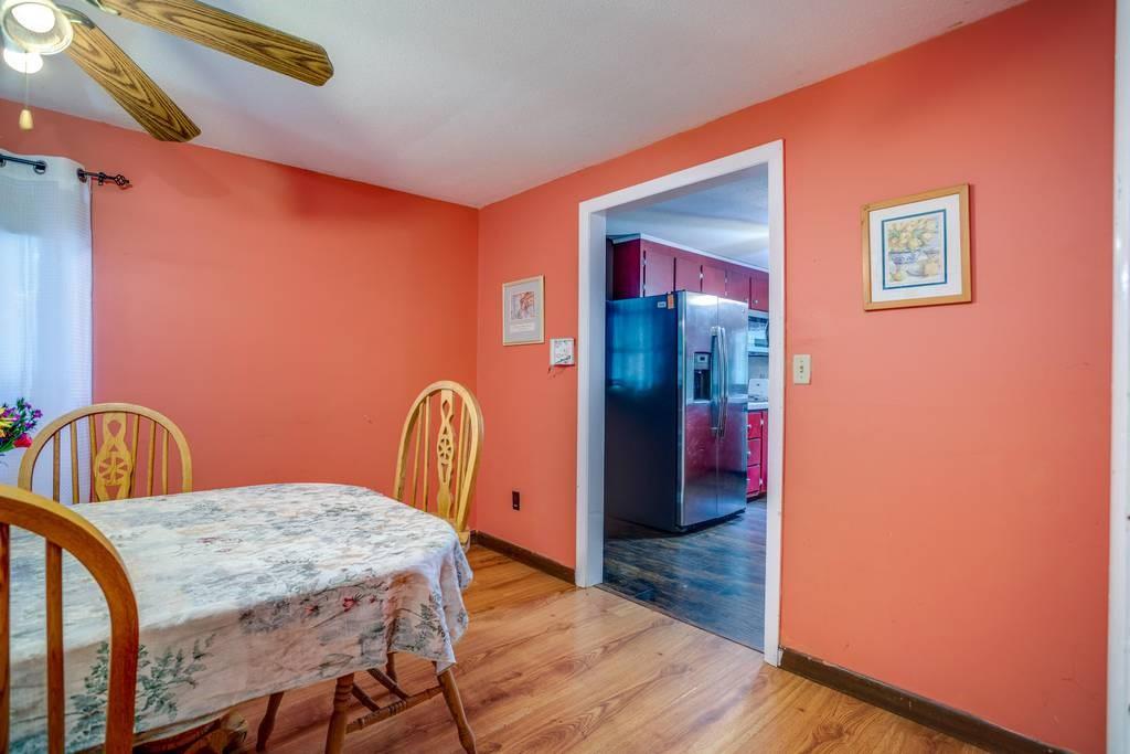 21 Tanner Road Webster, MA 01570 - Photo 7 of 26 a bedroom with a bed and a table