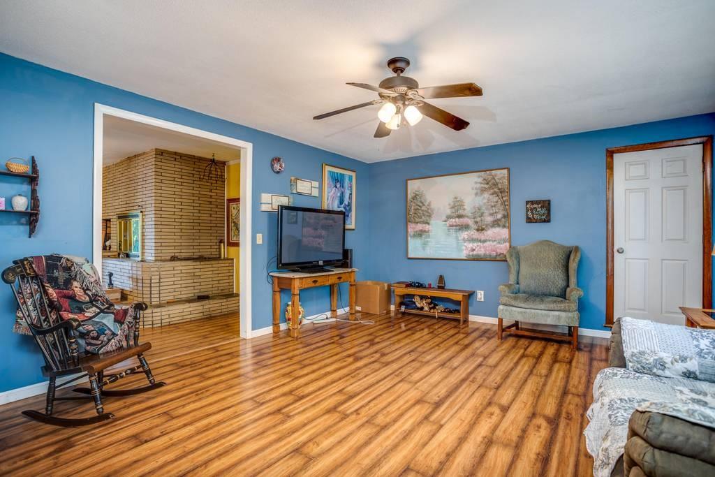 21 Tanner Road Webster, MA 01570 - Photo 8 of 26 a living room with furniture and a flat screen tv