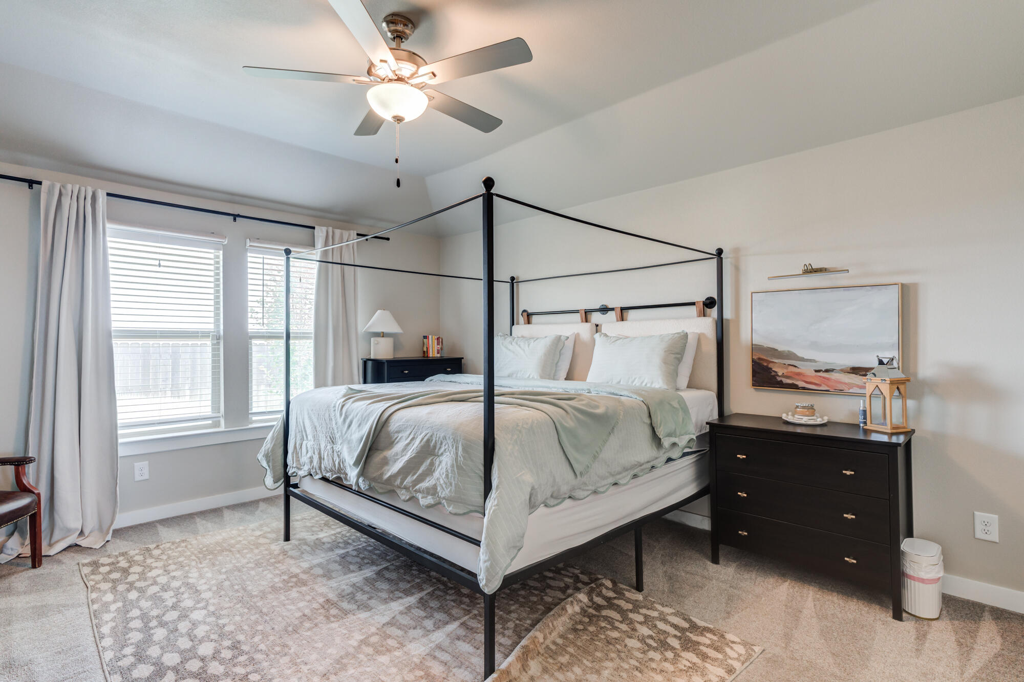 4613 126th Street Lubbock, TX 79424 - Photo 19 of 37 a bedroom with a bed and a window