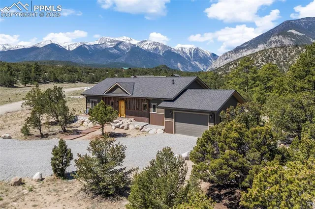 a view of house with outdoor space and river