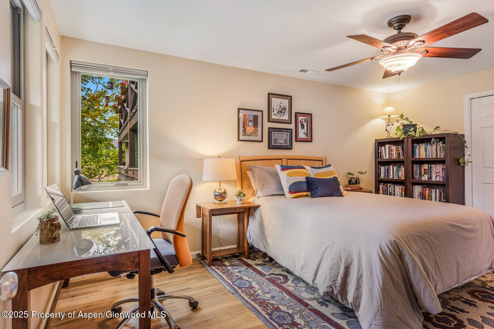 113 Lakeside Court Basalt, CO 81621 - Photo 24 of 39 a bedroom with a bed and a bookshelf