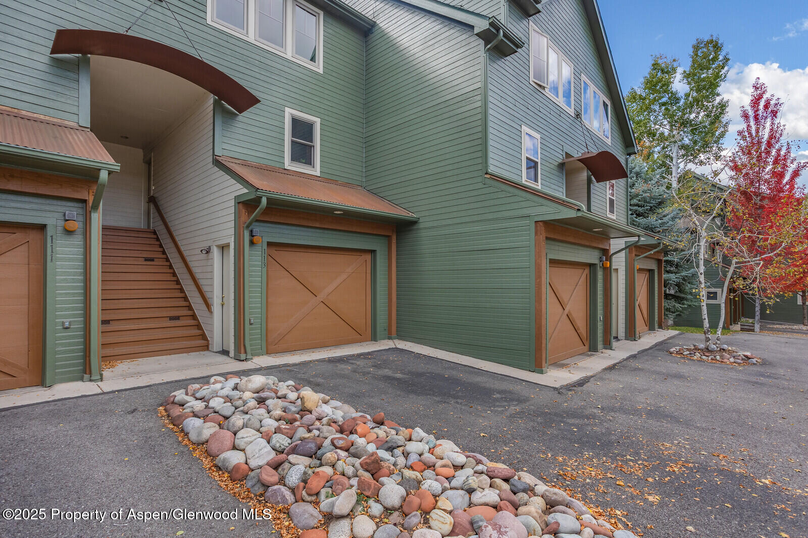 113 Lakeside Court Basalt, CO 81621 - Photo 38 of 39 a view of a house with a door and wooden walls