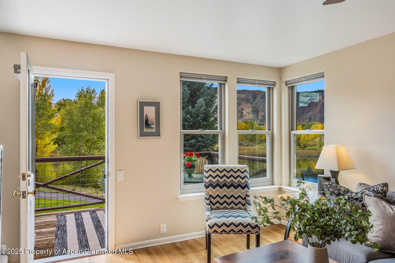 113 Lakeside Court Basalt, CO 81621 - Photo 5 of 39 a living room with furniture and a window