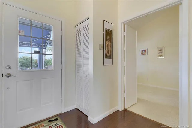 a kitchen with stainless steel appliances a stove a microwave and a refrigerator