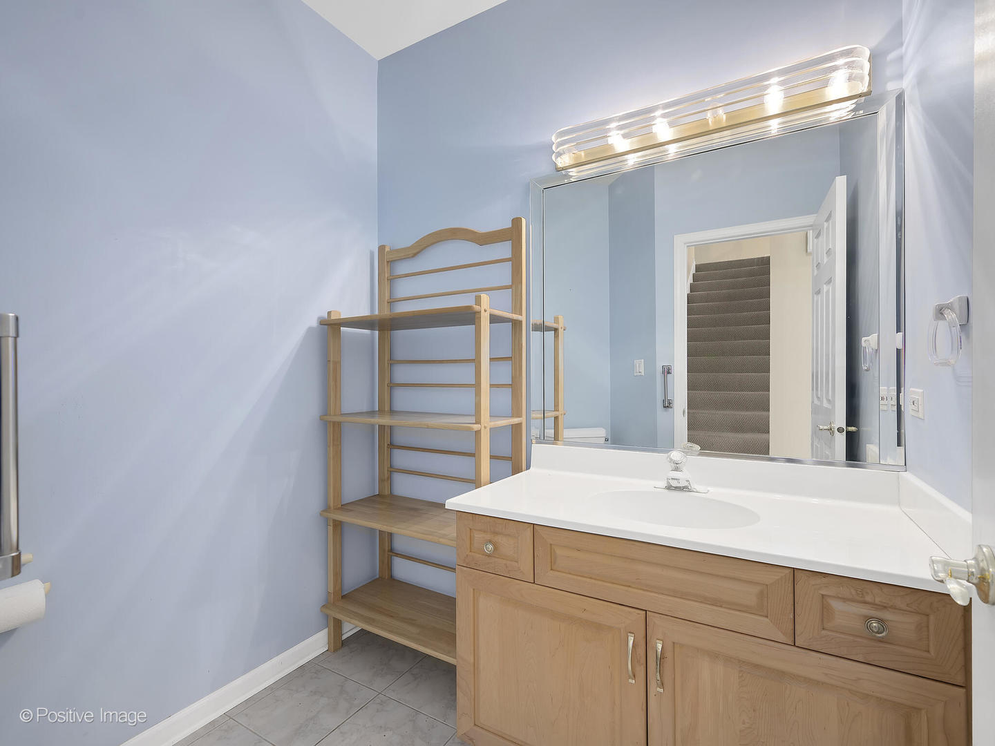 1332 Arbor Drive Lemont, IL 60439 - Photo 20 of 31 a bathroom with a sink and a mirror