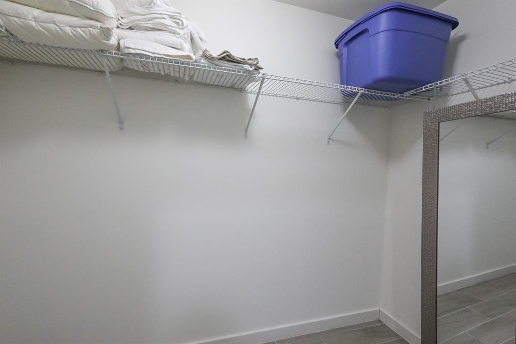 999 Southwest 1st Avenue, Unit 2913 Miami, FL 33130 - Photo 18 of 36 a room with a cabinet and a table