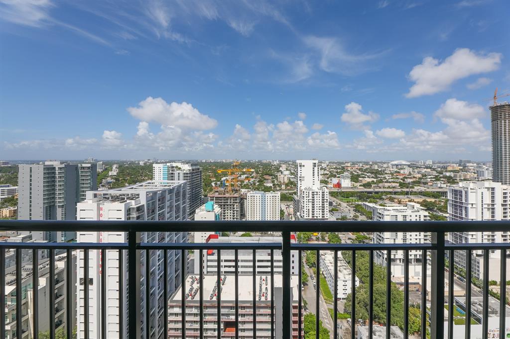 999 Southwest 1st Avenue, Unit 2913 Miami, FL 33130 - Photo 21 of 36 a view of a balcony with city view