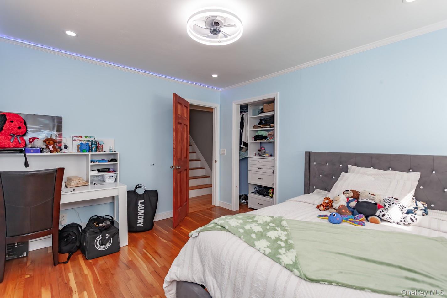 49 Meadow Road Montrose, NY 10548 - Photo 29 of 50 Bedroom featuring wood-finish flooring, recessed lighting, and crown molding
