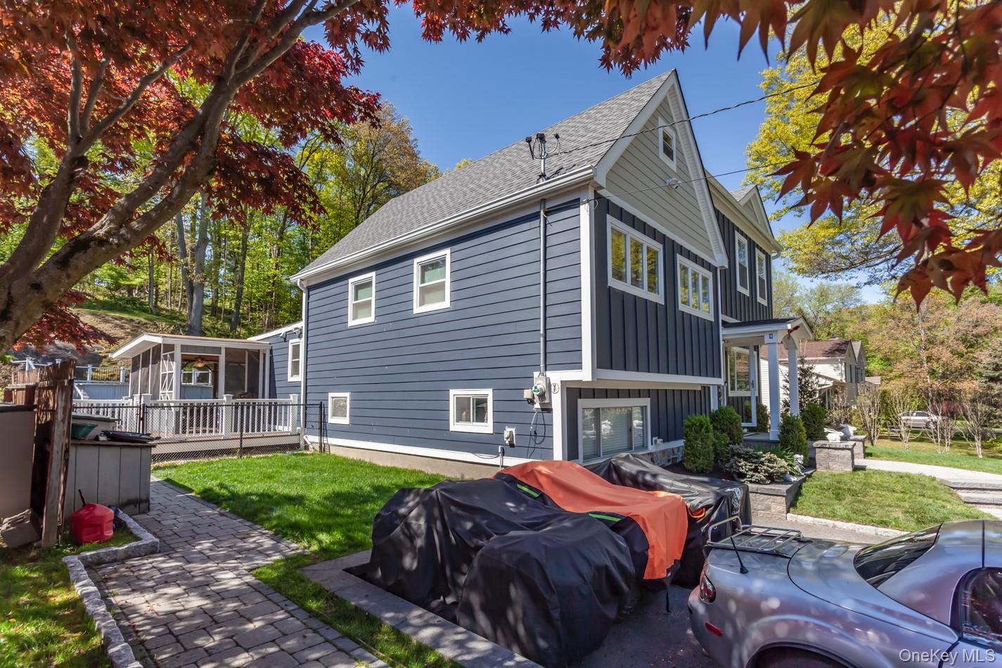 49 Meadow Road Montrose, NY 10548 - Photo 39 of 50 Two-story residence featuring deep blue siding with contrasting white trim