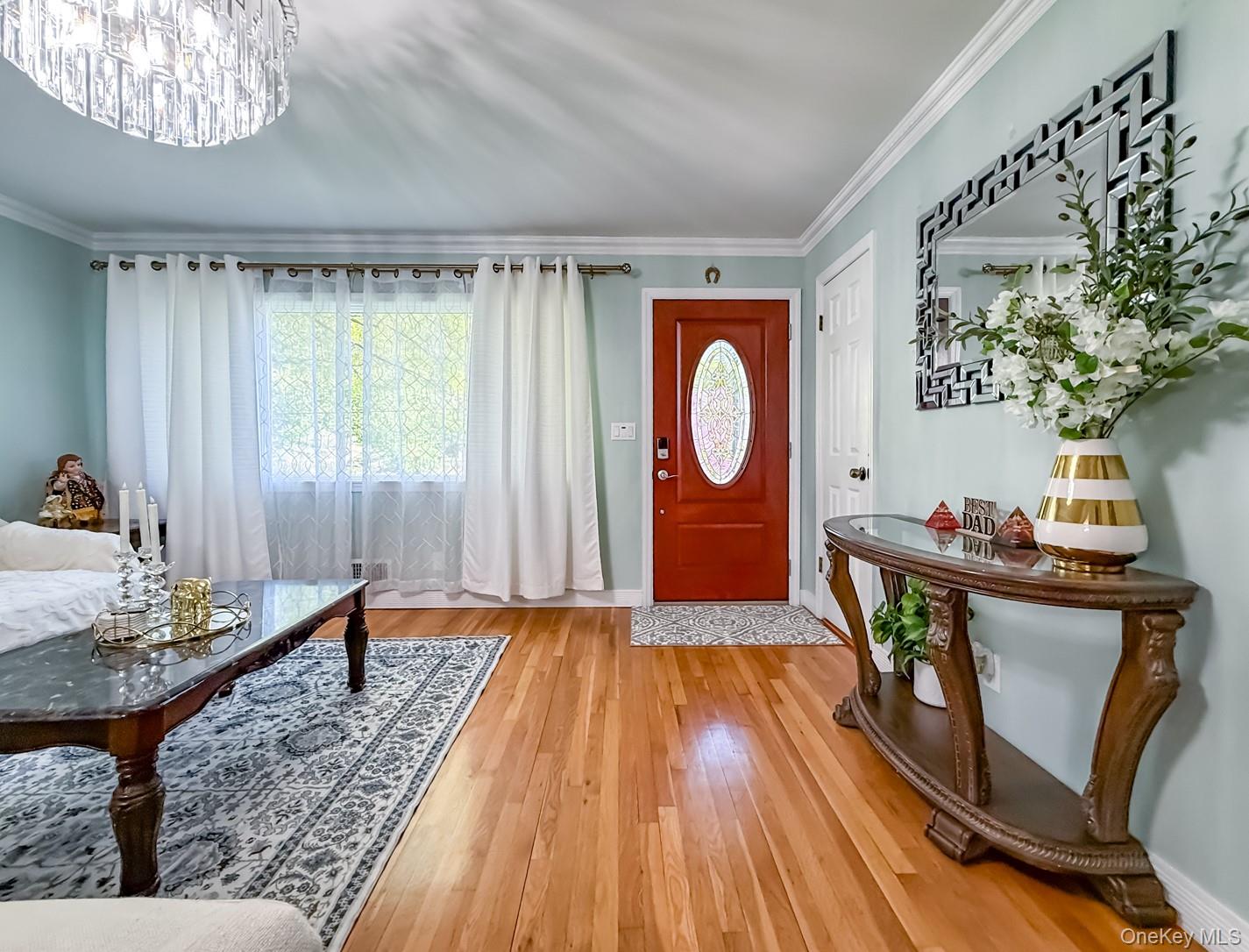49 Meadow Road Montrose, NY 10548 - Photo 5 of 50 Entryway with a vibrant red door featuring an oval glass insert