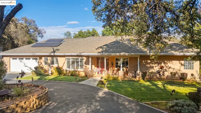 front view of house with a yard