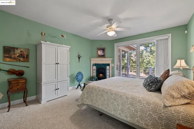 a bedroom with a bed dresser and a window