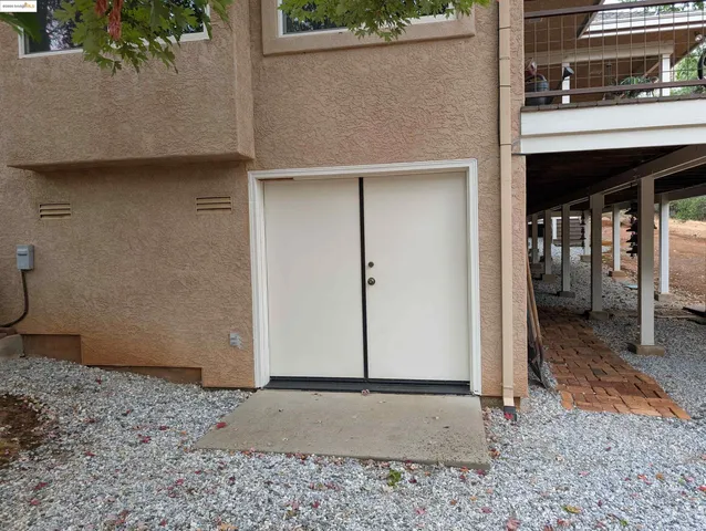 a house view with a outdoor space