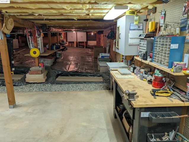 a utility room with washer and dryer