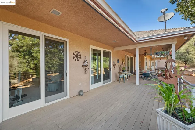 a view of livingroom with furniture and floor to ceiling window