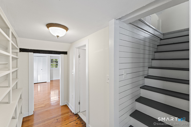 3 Riverside Road, Unit B Newtown, CT 06482 - Photo 10 of 20 a view of entryway with wooden floor